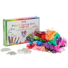 the plastic lace kit is packed with different colored cords and pieces of stringing material