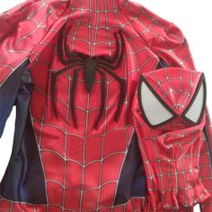 a spider - man costume is shown on display