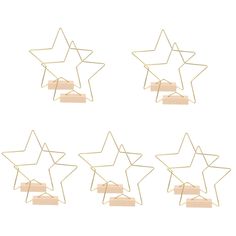 six wooden stars are arranged in the shape of a star