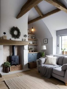 a living room filled with furniture and a fire place in the middle of a room