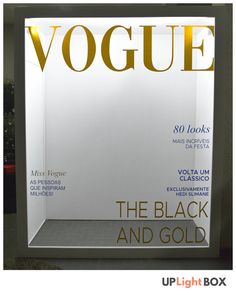 the front cover of a magazine with gold lettering