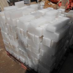 several blocks of white plastic stacked on top of each other