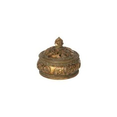 an ornately decorated brass box on a white background