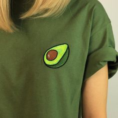 This tee features a relaxed fit, green cotton construction, and colorful embroidered avocado on the frontSize: • M: Bust: 100 cm/ 39.4 in, Length: 66 cm/ 26.0 in • L: Bust: 106 cm/ 41.7 in, Length: 72 cm/ 28.3 in Material: 100% Cotton Free Worldwide Delivery Delivery time: 15-35 days Avocado Stuff, 90s Retro Fashion, Retro Summer Outfits, Avocado Shirt, Avocado T Shirt, Underground Clothing, Retro Fashion Outfits, Summer Grunge, Egirl Fashion