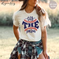 🖤 Welcome to Legendary Apparel Shop 🖤 We make cool tee shirts, tank tops, hoodies, sweatshirts and mugs for people just like you! This Tis The Season Baseball style is available in a unisex tee shirt, racerback tank and crop tee, crop hoodie and pullover hoodie. Perfect for baseball season, cheering in the bleachers or anyone that loves comfy tee shirts! Our products are made to order and ship in 1-2 business days! We design and decorate all of our products here at our shop Florida's Space Coa Mom Baseball Shirts, Baseball Tank, The Bleachers, Baseball Tee Shirts, Cool Tee Shirts, Baseball Mom Shirts, Baseball Tees, Baseball Season, Crop Hoodie