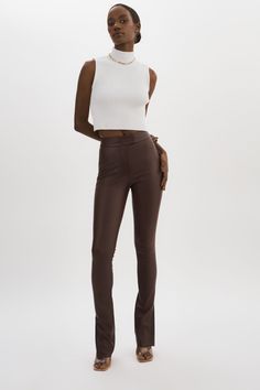 Your go-to leather pants get a sleek new update. Cut from supple stretch lamb leather with a second-skin fit, they feature a high waist and straight leg with a side split hem for an edgy flair. Wear with everything from casual t-shirts to bodysuits. Brown Suede Pants, Short Cuir, Brown Leather Pants, Suede Pants, Side Split, Split Hem, Brown Suede, Second Skin, Skirt Pants