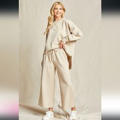 This Brand New Set Includes A Cream Long Sleeve Top With Matching Wide Leg (Functional) Drawstring Pants. There Is A Really Neat Textured Pattern Of Lines Throughout The Top And Pants. Wear This Set To Lounge Around In, Sleep In, Shop In, Or For Dropping Your Kids Off To School. Top Fits Oversized. Pants Are True To Size. (Only Tried On For The Picture) Smoke Free Home. Offers Welcome. Oversized Beige Bottoms For Fall, Oversized Wide-leg Loungewear Bottoms, Cream Casual Wide Leg Pants For Loungewear, Casual Cream Wide Leg Lounge Pants, Cream Wide Leg Loungewear Pants With Elastic Waistband, Cream Wide Leg Pants With Elastic Waistband For Loungewear, Casual Beige Bottoms For Relaxation, Oversized Wide-leg Lounge Pants, Oversized Pants For Loungewear