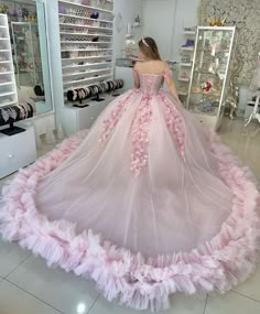 Step into your fairytale moment with this enchanting pink off-the-shoulder Quinceanera ball gown. This dress is crafted from luxurious tulle fabric, offering volume and elegance in every movement. The soft pink hue adds a touch of youthful charm, perfect for celebrating your special day. The off-the-shoulder neckline gracefully frames the shoulders, while intricate appliqued embellishments enhance its romantic appeal. A sweeping train adds a regal finish, making every step memorable. The lace-up Pink Sweet 16 Dress, Princess Quinceanera Dresses, Gown Sleeves, Quinceanera Themes Dresses, Quinceñera Dresses, Dresses Off Shoulder, Pink Ball Gown, Gown Pink, Quinceanera Dresses Pink