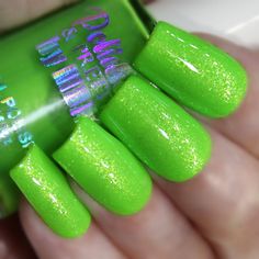 Kiwi Twist-Bright green with a green-gold shimmer. Neon-Black Light Reactive. From our Fruitopia-Neon Shimmer Collection. All colors are Black Light Reactive. But Blues and Purples do not have a strong neon reaction. Our Nail Polish is a large 15ml bottle and is Cruelty Free and 21 Free.  What is 21-free? Many nail polishes found in stores may contain toxins. Our 21 Free Nail Polishes avoids these  ingredients: no animal products, toluene, benzene, xylene, formaldehyde releaser, formaldehyde resin, phtalates, cyclic silicones, camphor, MEK, glycol ethers of series E, HQ, MEHQ, TPP, nonylphenol ethoxylated, Tert-Butyl hydroperoxyde, chromium oxide greens, bismuth oxychloride, CMR, synthetic fragrance, ethyl tosylamide. Our polishes are intended to be applied as 2-3 coats. We prefer a thin f Green Nails Glitter, Neon Rainbow Nails, Lime Green Nails, Shimmer Nail Polish, Neon Black, Bottle Picture, Nail Shimmer, Neon Rainbow, Nails Glitter