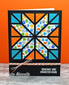 a card with an image of a colorful geometric design