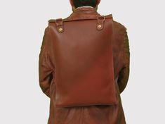 Simple, elegant and minimalist leather backpack that is designed to accommodate your daily belongings. your daily go to companion for college, gym or evening walk-Rugged and vintage looks of full grain leather. treat for men and women who love sophistication! Features: - Soft Cotton Interior Lining - Hidden Back Pocket - Padded Laptop Compartment - Smooth & Sturdy YKK Zipper - Wear-Proof and Durable Material & Dimensions: - Made of High-Quality Full Grain Leather - Approx. Dimensions in cm: 29x1 Everyday Leather Backpack With Smooth Grain, Daily Use Leather Backpack With Smooth Grain, Modern Brown Leather Backpack For Daily Use, Brown Leather Backpack For Daily Use, Daily Leather Backpack, Modern Rectangular Backpack With Smooth Grain, Modern Smooth Grain Leather Rectangular Backpack, Everyday Rectangular Leather Backpack With Smooth Grain, Rectangular Soft Leather Backpack For Daily Use