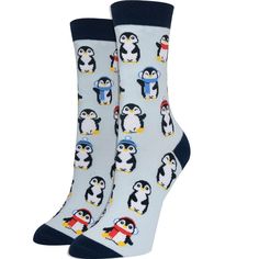 Penguin socks for women. Featuring cute penguins dressed up in hats and scarves for cold weather. These women's penguin socks are a great way to add a pop of color to any outfit. Casual Winter Socks For Stocking Stuffers, Novelty Winter Socks For Gifts, Novelty Winter Socks As Gift, Novelty Socks For Winter Gift, Novelty Winter Socks For Gift, Casual Socks As Gift For Fall, Casual Socks As A Gift For Fall, Casual Socks For Fall Gift, Casual Socks For Fall