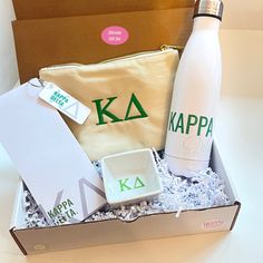 an open box containing a white bottle and personal items