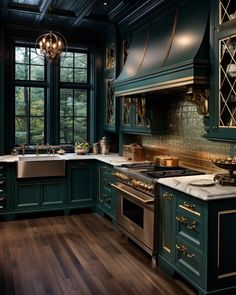 a large kitchen with green cabinets and wood flooring is pictured in this image from the front view