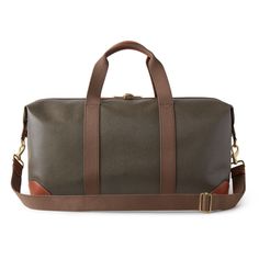 Nothing says 'classic Mulberry' like our Scotchgrain luggage collection. Its beautifully textured surface is accented by smooth leather trim. Travel pieces should be built to last, and look good while doing it. A timeless travel bag in a medium size, this clipper has two short handles and a detachable shoulder strap. Leather trim detailing Two canvas handles with leather detailing Detachable and adjustable canvas shoulder strap Metal feet at the base of bag Detachable luggage tag Internal Mulber Classic Bags With Epsom Leather And Leather Trim, Classic Bags With Leather Trim And Epsom Leather, Classic Epsom Leather Bags With Leather Trim, Classic Brown Saffiano Leather Bag, Luxury Business Travel Bag With Leather Trim, Classic Epsom Leather Travel Bag, Designer Brown Luggage With Leather Trim, Brown Leather Trim Bag For Everyday Luxury, Luxury Brown Coated Canvas Luggage