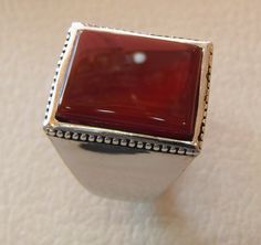 Rectangular silver aqeeq flat natural semi precious agate carnelian gemstone men ring sterling silver 925 jewelry all sizes fast shipping Risk free Quality guarantee policy : If you are not satisfied with your item for any reason simply send it to us and you will get a replacement or refund . please write or choose your size with the order and we will size it for you . Our ring is handcrafted mostly with a few simple tools . but some methods are used in casting like lost wax method . sterling si Modern Carnelian Jewelry For Formal Occasions, Modern Chalcedony Jewelry With Polished Finish, Modern Carnelian Jewelry With Polished Finish, Modern Carnelian Gemstone Jewelry, Formal Chalcedony Jewelry With Polished Finish, Formal Rectangular Jewelry With Polished Edges, Classic Chalcedony Ring Jewelry, Formal Agate Ring Jewelry, Formal Carnelian Cabochon Jewelry