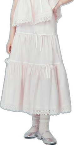 Sweet White Summer Skirt, Spring Cotton Petticoat With Ruffles, Elegant Cotton Petticoat For Spring, Spring Cotton Flowy Petticoat, Flowy Cotton Petticoat For Spring, Summer Cotton Tiered Skirt Petticoat, Sweet Tiered Skirt For Spring, Summer Cotton Tiered Petticoat, Spring Cotton Petticoat With Tiered Skirt