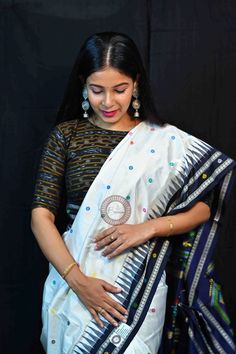 Traditional Banarasi Silk Saree With Ikat Print, Traditional Ikat Print Cotton Silk Dupatta, Traditional Cotton Silk Dupatta With Ikat Print, Festival Cotton Silk Ikat Print Saree, Festival Cotton Silk Saree With Ikat Print, Traditional White Ikat Print Dupatta, White Traditional Ikat Print Dupatta, Blue Saree With Woven Motifs For Navratri, Festive Paithani Silk Traditional Wear With Ikat Print