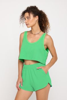 It's a breeze. A relaxed fit, drop length, scoop neck tank. Made in our Plush French Terry fabrication, it's the perfect blend of 75% cotton and 25% modal, creating an extra (extra) soft feel. | Bree Boxy Tank Top in Palm Green Sporty Relaxed Fit Muscle Tee For Spring, Sporty Muscle Tee With Relaxed Fit For Spring, Spring Athleisure Muscle Tee For Loungewear, Relaxed Cotton Tops For Leisure, Cotton Tank Crop Top In Athleisure Style, Cotton Athleisure Tank Crop Top, Athleisure Cotton Tank Crop Top, Sporty Cotton Tank Top For Spring, Athleisure Crew Neck Tank Top For Loungewear