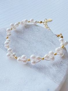 Freshwater Pearl Bracelet, Gold Bracelet For Her, Bridal Bracelet, Pearl Beaded Bracelet,Bracelet for Women,Bridesmaid Gift, Birthday Gifts Perfect for daily wear or as a meaningful gift for the ones you love. Each one is made by heart and love. Shop now and add it to your jewelry collection!  The bracelet features an extended chain (5cm) for added versatility, allowing you to choose from three different sizes for the perfect fit!  If you have a specific bracelet length in mind, simply leave you Cheap White Pearl Bracelet For Birthday, Handmade Adjustable Pearl Bracelet For Wedding, Round Pearl Crystal Bracelet For Gift, White Wire Wrapped Bracelets For Wedding, Pearl White Bangle Bracelets For Gifts, Pearl White Beaded Bracelet For Gift, Pearl White Beaded Bracelet Gift, Pearl White Bangle Bracelet Gift, Pearl White Bangle Bracelet For Gift