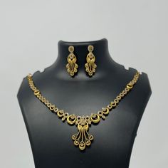 Description: Premium Quality  Gold Plated CZ necklace and matching earrings are lightweight and made with the highest quality craftsmanship. They are a stunning addition to any outfit and will make a perfect gift for any occasion. Features: Crystal stones Lightweight and elegant Can be paired with any dress, kurti, or saree DESIGN: we have 4 different necklace sets in this Listing 1. Gold Dangle Set 2.Flower Pearl Drop 3.All Flowers 🌸 1 4. All Flowers 🌸 2 Material: Cubic Zirconia (CZ) Stones P Elegant Gold Plated Filigree Jewelry Sets, Elegant Gold-plated Filigree Jewelry Sets, Gold Diamond Jewelry Sets With Earrings, Gold Diamond Jewelry Set With Matching Earrings, Gold Diamond Bridal Necklace With Matching Earrings, Formal Gold Plated Filigree Jewelry Sets, Elegant Filigree Jewelry Sets For Celebration, Elegant Filigree Jewelry Sets, Elegant Bridal Necklace With Filigree For Celebration