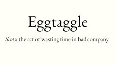 the words eggtaggle are written in black ink on a white background with an image of