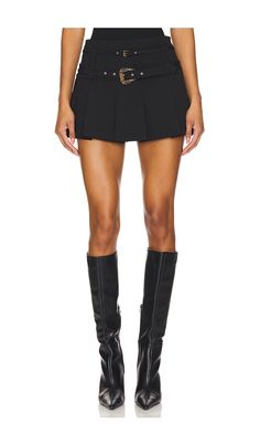 Find VERSACE Skirt on Editorialist. Versace Jeans Couture Skirt in Black. - size 36 (also in 38, 40, 42, 44, 46) Versace Jeans Couture Skirt in Black. - size 36 (also in 38, 40, 42, 44, 46) Self: 49% viscose 42% polyamide 9% elastane Lining: 100% polyester. Made in Italy. Hand wash. Unlined. Hidden side zipper closure. Adjustable buckled straps with gold-tone hardware. Pleated crepe fabric. Skirt measures approx 12.5 in length. VJEA-WQ9. E77HAE814_EN0394. Casual Dressy Outfits, Versace Skirt, Versace Print, Expensive Stuff, Couture Skirts, Dressy Casual Outfits, Fabric Skirt, Latest Skirts, Casual Dressy