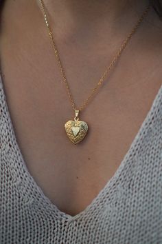 18-karat gold plated dainty heart locket hangs on a sturdy 18-karat gold plated stainless steel chain. Choose your chain length from the drop-down menu.  Chain length (model wears): 18 inches  You can choose the locket as is, without photos, or have it personalized with your photo (s). The picture you choose will be printed on professional photo paper.  ENGRAVING SERVICE  You can choose the locket as is, or have it personalized by engraving your birth flower, initial or a short message at the ba Heart Charm Medallion Jewelry For Anniversary Gift, Dainty Gold Locket Necklace With Charms, Dainty Heart Pendant Locket Jewelry, Gold Locket Charm Necklace For Valentine's Day, Gold Plated Heart Pendant Locket Jewelry, Gold Plated Heart Pendant Locket, Heart Shaped Gold Plated Jewelry For Keepsake, Gold Double Heart Locket Necklace Gift, Gold Plated Heart-shaped Keepsake Jewelry