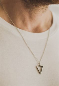 Necklace for men - men's necklace with a silver plated triangle pendant on a stainless steel chain and a clasp closure. Chain material: stainless steel Pendant material: silver more... Necklace for men - men's necklace with a silver plated triangle pendant on a stainless steel chain and a clasp closure. Chain material: stainless steel Pendant material: silver plated Chain length: approximately 22 inches (56 cm). please let us know if you would like a different length. This necklace is great as a gift for a man or a boy. All of our jewelry comes wrapped and ready for gift giving! less... Necklace For Men Silver, Chain Necklace For Men, Necklace Packaging, Stainless Steel Chain Necklace, Mens Jewelry Necklace, Mens Chain Necklace, Geometric Necklace, Necklace For Men, Geometric Pendant