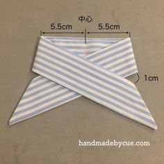 an origami airplane is shown with measurements