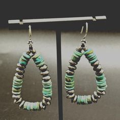 Gorgeous green turquoise and silver bead earrings.  These dramatic earrings have a vintage feel and the turquoise is the perfect shade of blue green. These beauties feature a 2.25 inch drop and the sterling silver Navajo pearl beads that makes them quite a statement piece. The detail in these beautiful earrings is amazing and they are sure to be a keepsake piece.   These long earrings would make a wonderful gift for mom, gift for girlfriend, anniversary gift, birthday gift or a lovely self care Vintage Turquoise Earrings With Dangling Beads, Vintage Turquoise Beaded Drop Earrings, Turquoise Silver Beads Drop Earrings, Turquoise Dangle Earrings With Silver Beads, Turquoise Drop Earrings With Silver Beads, Green Bohemian Beaded Earrings In Sterling Silver, Bohemian Green Beaded Sterling Silver Earrings, Southwestern Green Beaded Dangle Earrings, Southwestern Green Earrings With Dangling Beads