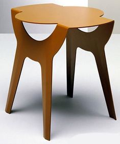 two wooden tables sitting next to each other