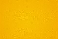 a yellow background with an animal skin pattern