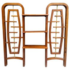 an art deco bookcase with two shelves on one side and another shelf on the other