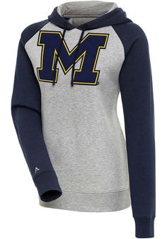 Antigua Michigan Wolverines Womens Victory Hoodie -  Grey Sporty Long Sleeve Sweatshirt With Contrast Stitching, Sporty Fall Sweatshirt With Contrast Stitching, Sporty Sweatshirt With Contrast Stitching For Fall, Sporty Fleece Hoodie With Drawstring, Gray Sporty Sweatshirt With Drawstring, Sporty Gray Sweatshirt With Drawstring, Sporty Hoodie With Drawstring For Sports, Varsity Sports Hoodie With Drawstring Hood, Sporty Hoodie For Game Day