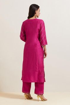 Pink natural weaves chanderi silk kurta with contrast paisley and floral embroidery. Comes with pant and shimmer organza dupatta.
Components: 3
Pattern: Embroidered
Type Of Work: Floral and Paisley
Neckline: Notched
Sleeve Type: Three Quarter
Fabric: Chanderi Silk, Shimmer Organza
Color: Pink
Other Details: 
Embroidered hem pant
Fringed border dupatta
Occasion: Puja - Aza Fashions Semi-stitched Cutdana Raw Silk Kurta, Transitional Art Silk Kurta With Cutdana, Slub Silk Kurta With Cutdana For Diwali, Silk Kurta With Resham Embroidery For Diwali, Silk Straight Kurta With Zari Work, Designer Semi-stitched Slub Silk Kurta, Bollywood Style Slub Silk Kurta With Chikankari Embroidery, Straight Kurta Churidar With Resham Embroidery In Slub Silk, Semi-stitched Slub Silk Kurta For Transitional Seasons