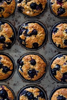 freshly baked blueberry muffins on a baking sheet