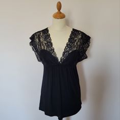 - New Without Tags - Excellent Condition - Beautiful Lace Detail - 94% Rayon, 6% Spandex Stretch Lace Trim Tops For Date Night, Stretch Black Tops For Daywear, Forever 21 Stretch Tops For Date Night, Black Lace Trim Top For Loungewear, Elegant Black Forever 21 Top, Elegant Black Top By Forever 21, Fitted Lace Trim Top From Forever 21, Forever 21 Elegant Black Top, Fitted Forever 21 Tops With Lace Trim