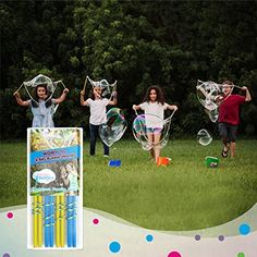 children are playing with bubbles in the grass while another child is running behind them and holding up their hands