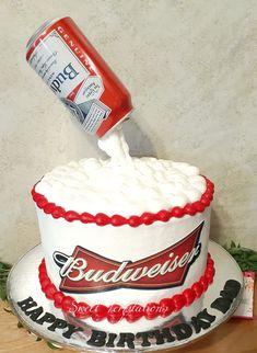 a birthday cake with a can of budweiser on top and the words happy birthday