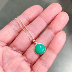 You can choose your own gem in my store. Let me know if you would like to see options Details of the pendants: Chrysoprase pendant Stone Weight: 7.10 carats Stone size and shape: 12 mm and round Metal: GOLD Purity: 14K (58.33%) approx Gold Weight: 0.51 grams Gross Weight: 1.93 grams Chrysoprase necklace pendant. These pendants are absolutely perfect for daily wear as they are light and definitely stylish This dainty pendant can be used in layers with other pendants. The initial price is for pend