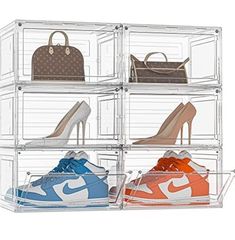 four clear acrylic boxes with shoes and purses in each one on the bottom shelf