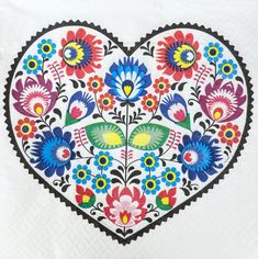 a heart with flowers painted on it