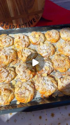 a pan filled with pastries sitting on top of a table