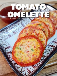 tomato omelette on a plate with ketchup