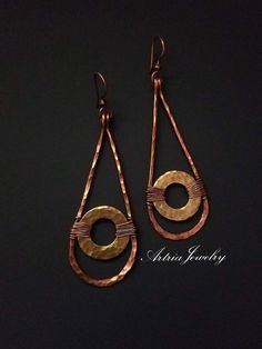 "These Mixed Metal Long Teardrop Earrings are a neat versatile pair of earrings. These earrings are part of our Taamba Collection. Taamba is the Sanskrit name for Copper. So apt for this collection, whether simple and small or large and intricate, as each piece is a statement made in copper - Copper is such a beautiful and versatile metal, suits every skin tone, can be heat painted or colored with various patinas to bring out colors across the rainbow light spectrum, from blues to greens, pinks Copper Jewelry Diy, Hammered Copper Earrings, Light Spectrum, Mixed Metal Rings, Mixed Metal Earrings, Rainbow Light, Hammered Brass, Wire Work Jewelry, Work Jewelry