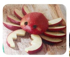 an apple cut in half to look like a crab