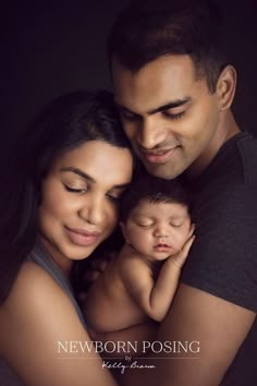 a man and woman holding a baby in their arms with the caption newborn posing