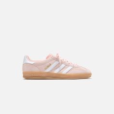 Women's Gazelle Indoor silhouette Suede upper Padded collar T-toe detail Textured tongue  Tri-Stripes on lateral sides  Gazelle gold foil branding on lateral sides  Flat woven laces Leather heel counter Gum rubber outsole   Style: aaih5484 Color: Sandy Pink / White / Gum 3 Material: Leather Light Pink Adidas Gazelle, Back To School Shoes Adidas, Adidas Shoes Women Pink, Pink And White Sambas, Light Pink Sambas, Gazzels Shoes, Colored Sambas, Back To School Shoes 2024, Pink Sneaker Outfits Women