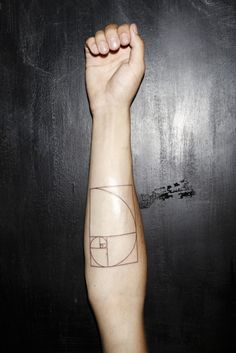 a person's arm with a tattoo on it that has a basketball hoop in the middle